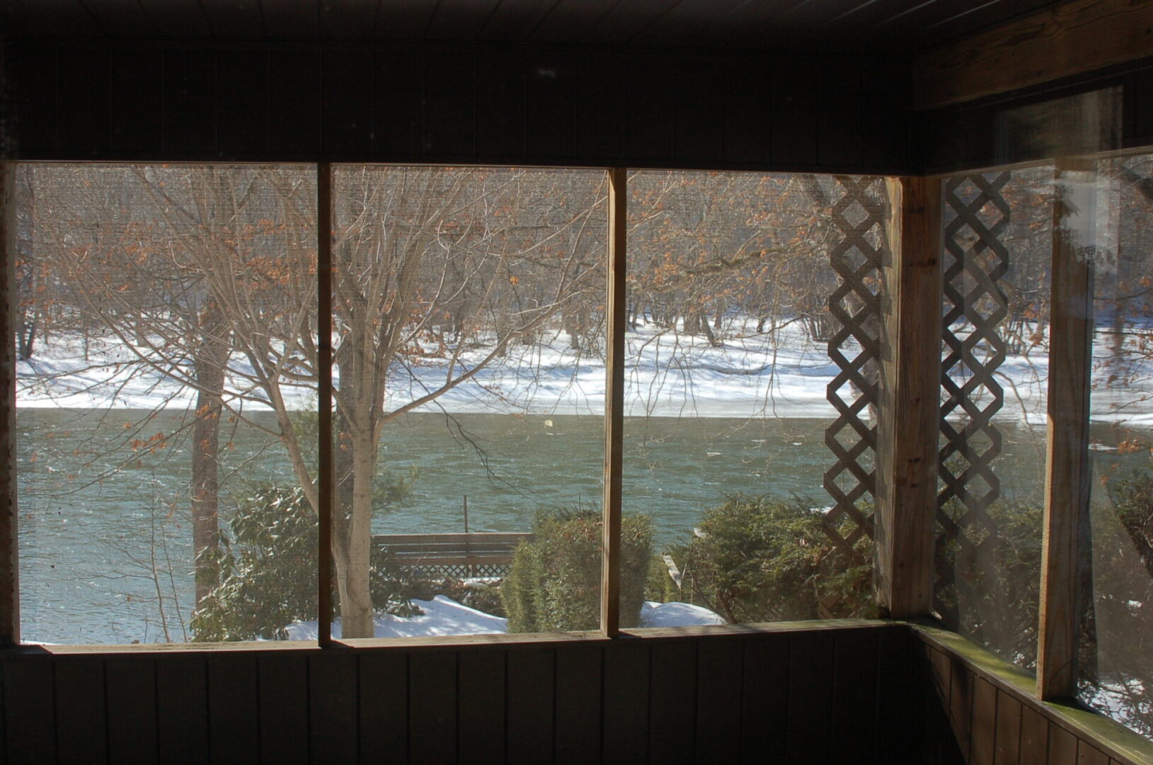 River view from a screened porch.